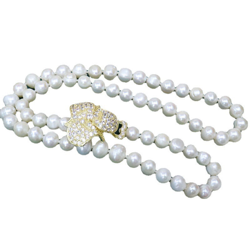 Freshwater pearl necklace women's versatile simple fashion jewelry nearly round and flawed niche design sense sweater chain wholesale