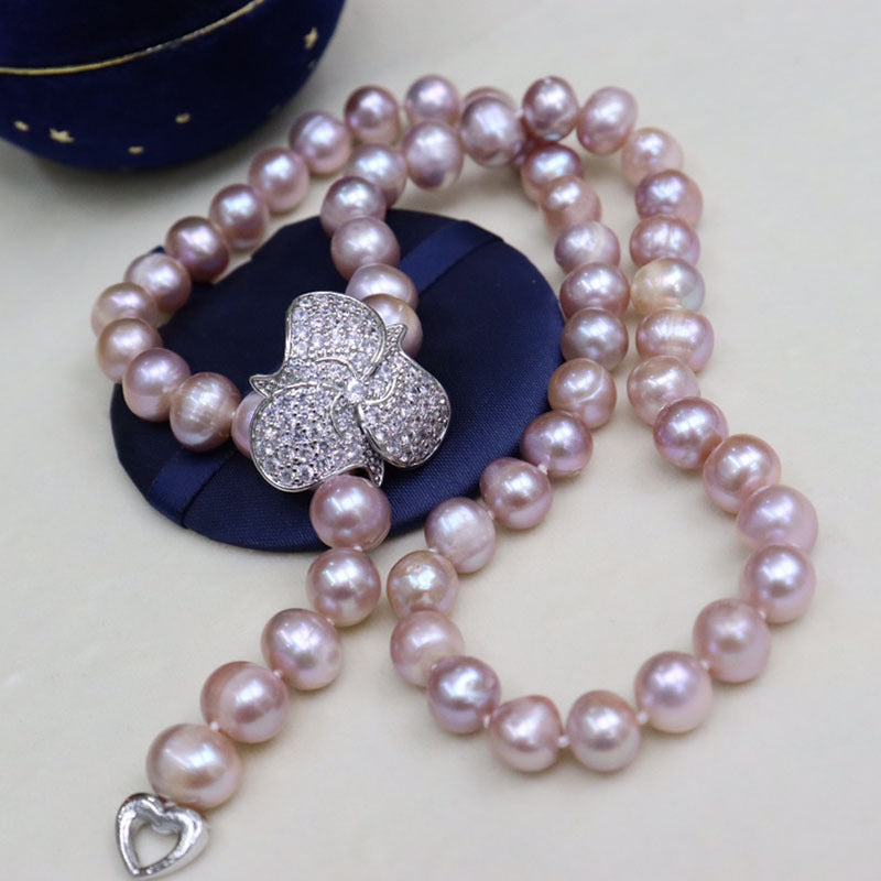 Freshwater pearl necklace women's versatile simple fashion jewelry nearly round and flawed niche design sense sweater chain wholesale