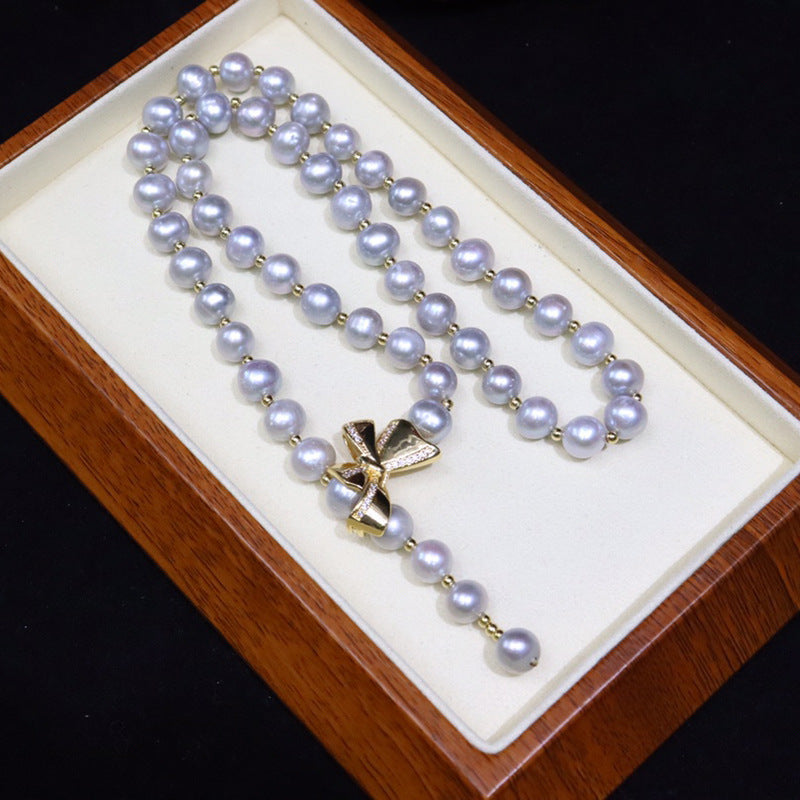 Freshwater pearl necklace women's versatile simple jewelry grandma gray nearly round flawed bow pearl sweater chain wholesale