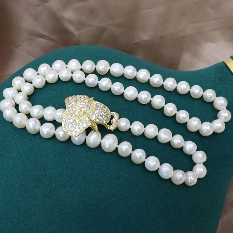 Freshwater pearl necklace women's versatile simple fashion jewelry nearly round and flawed niche design sense sweater chain wholesale