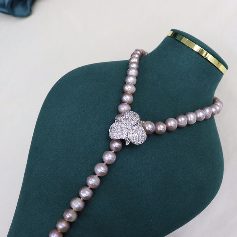 Freshwater pearl necklace women's versatile simple fashion jewelry nearly round and flawed niche design sense sweater chain wholesale