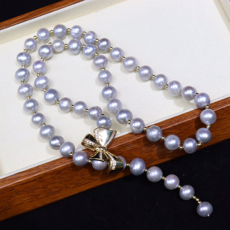 Freshwater pearl necklace women's versatile simple jewelry grandma gray nearly round flawed bow pearl sweater chain wholesale