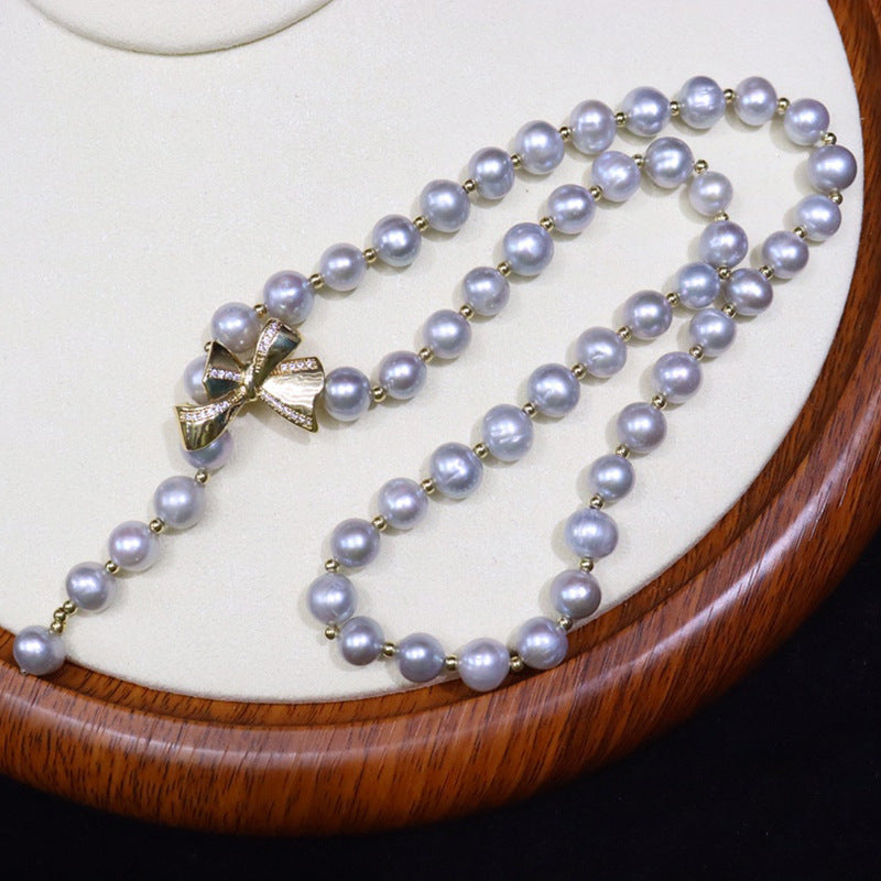 Freshwater pearl necklace women's versatile simple jewelry grandma gray nearly round flawed bow pearl sweater chain wholesale