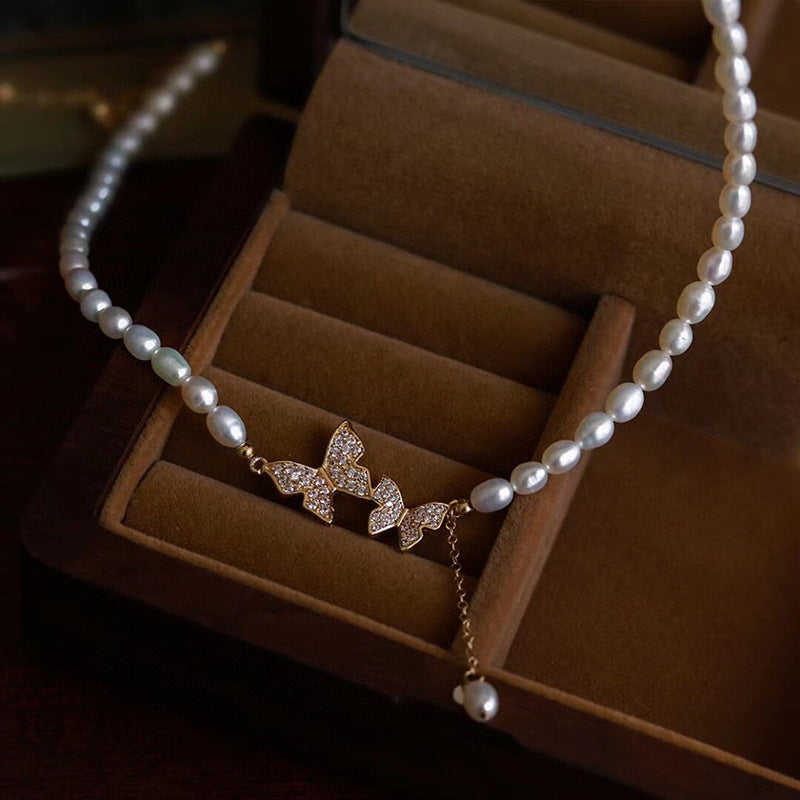 Freshwater pearl necklace versatile temperament jewelry niche design high-end clavicle chain pendant millet pearl necklace