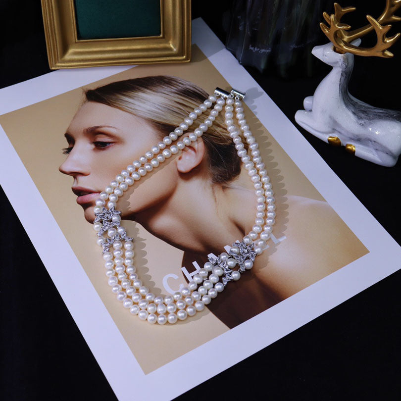 Manufacturer wholesale natural freshwater pearl necklace women, light luxury niche design sense fashion temperament, three-layer collarbone chain