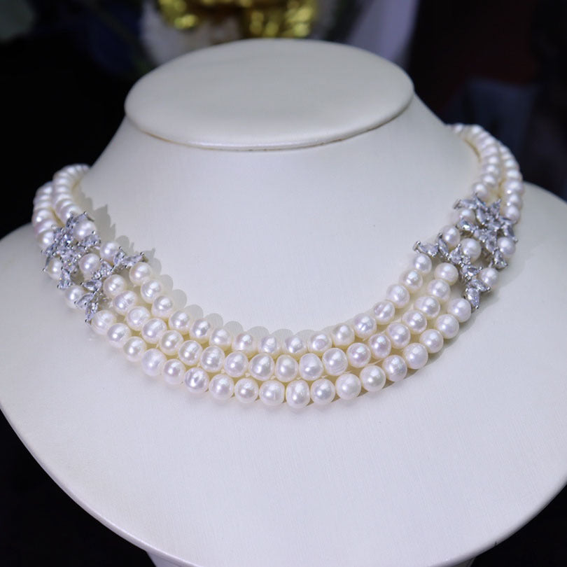 Manufacturer wholesale natural freshwater pearl necklace women, light luxury niche design sense fashion temperament, three-layer collarbone chain